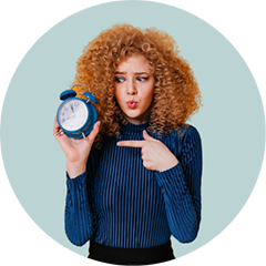 Quick links Photo of woman holding clock