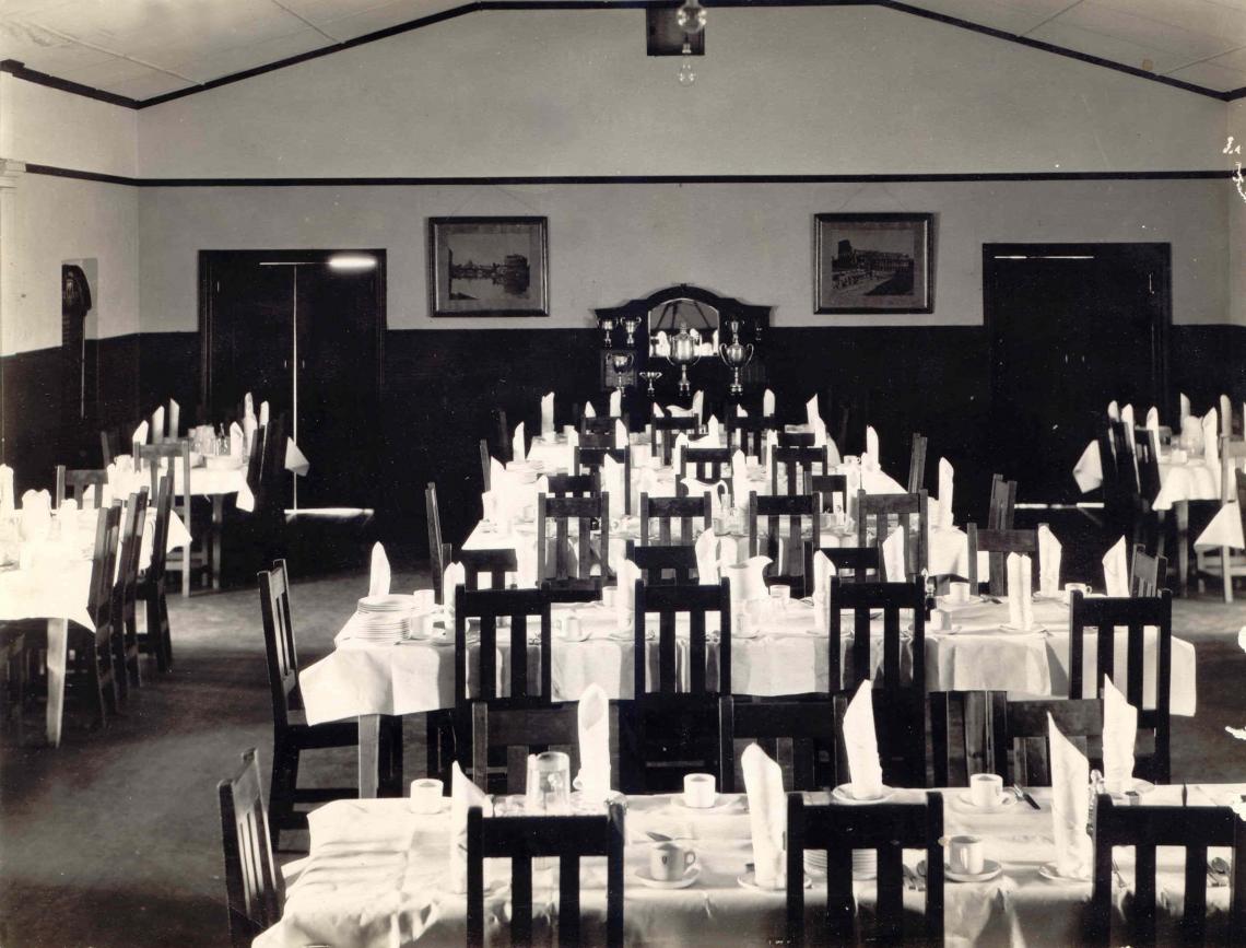 Heimat dining hall set for dinner